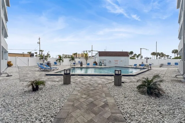 a view of a terrace with chairs