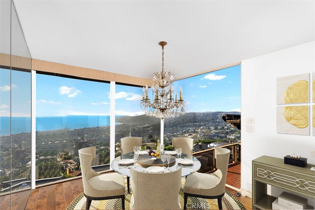 1339 La Mirada Street Laguna Beach, CA 92651 - Photo 14 of 28 a dining room with furniture a chandelier and window