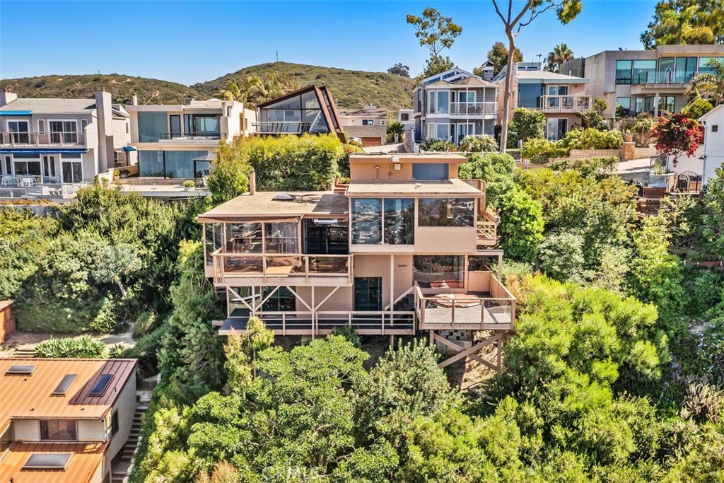 1339 La Mirada Street Laguna Beach, CA 92651 - Photo 24 of 28 a aerial view of a residential apartment building with a yard