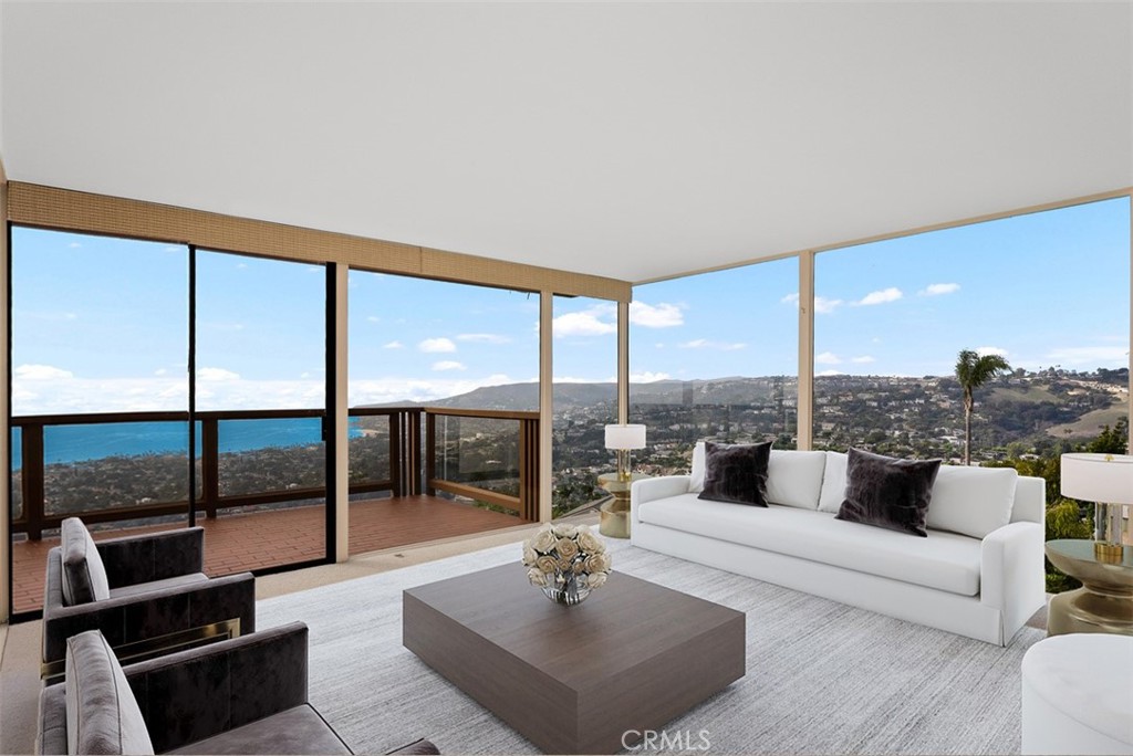1339 La Mirada Street Laguna Beach, CA 92651 - Photo 5 of 28 a living room with furniture and a large window