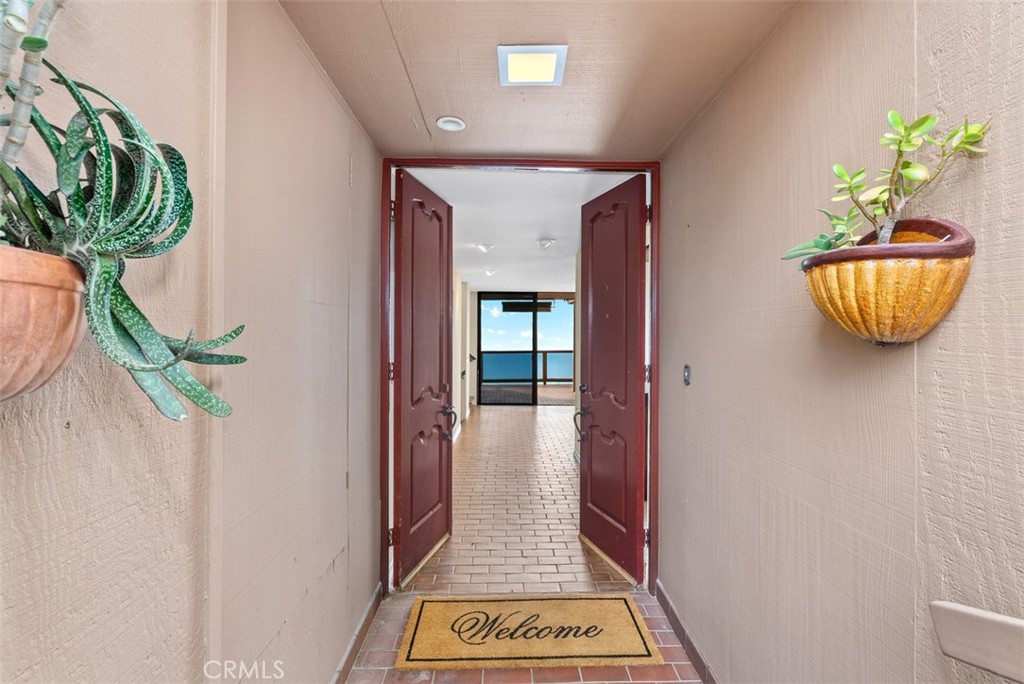 1339 La Mirada Street Laguna Beach, CA 92651 - Photo 10 of 28 a view of a hallway with a potted plant