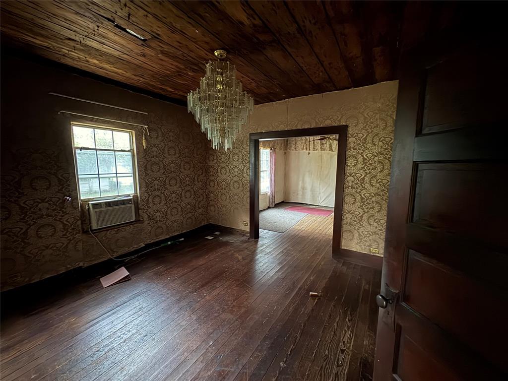 625 South Rusk Street Sherman, TX 75090 - Photo 14 of 19 a view of entryway with wooden floor