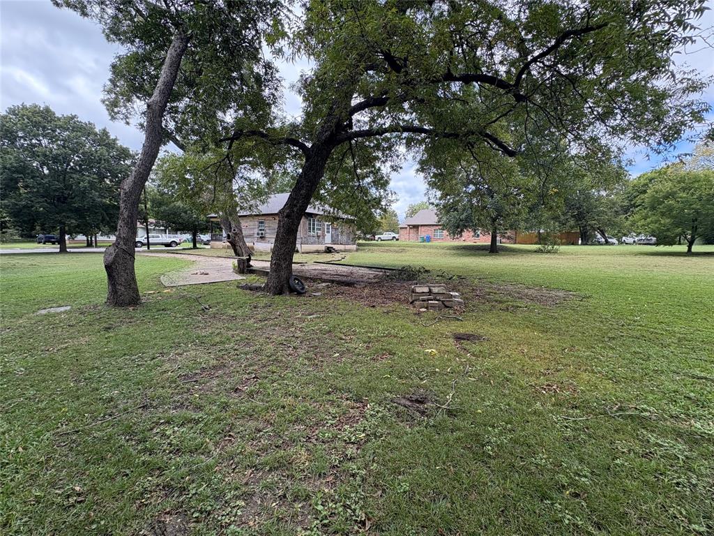 625 South Rusk Street Sherman, TX 75090 - Photo 18 of 19 a view of yard with trees