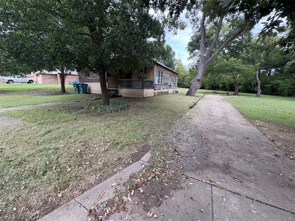 625 South Rusk Street Sherman, TX 75090 - Photo 3 of 19 a view of outdoor space with tree s
