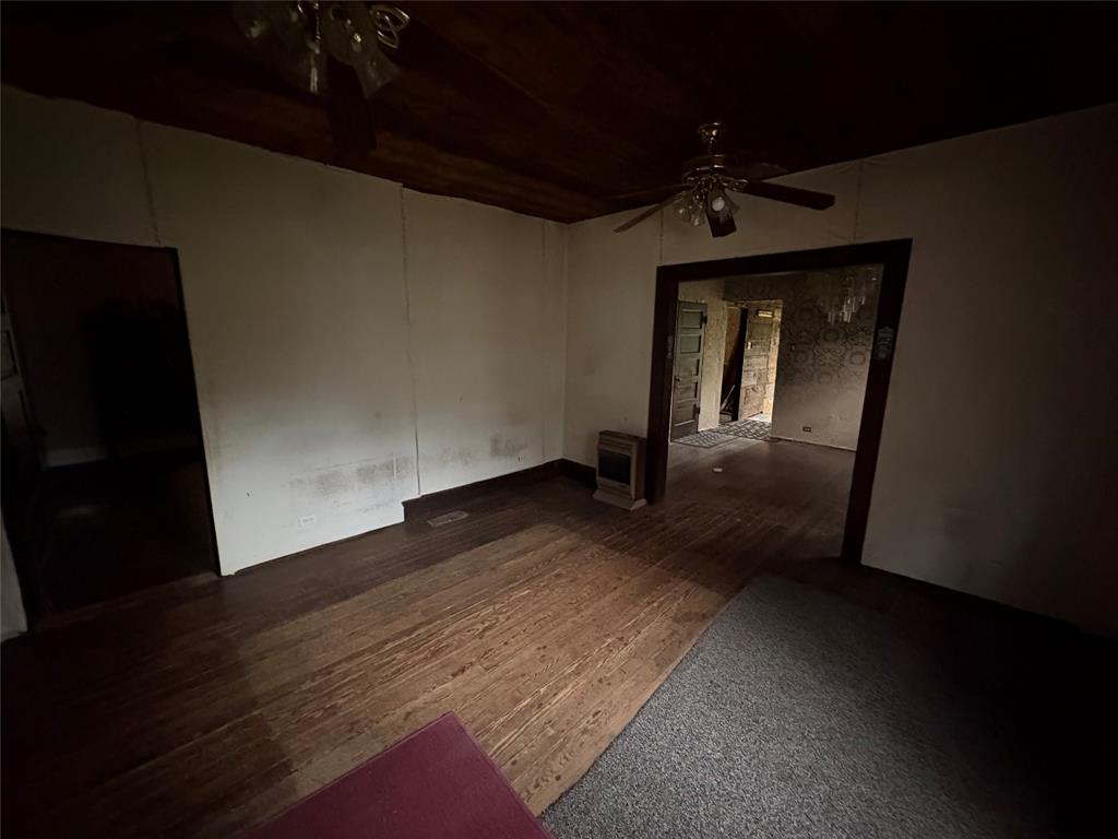 625 South Rusk Street Sherman, TX 75090 - Photo 9 of 19 a view of empty room with wooden floor and fan