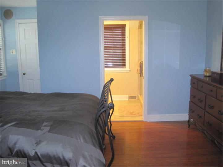 351 Mill Road Havertown, PA 19083 - Photo 14 of 24 a bedroom with a bed and a window