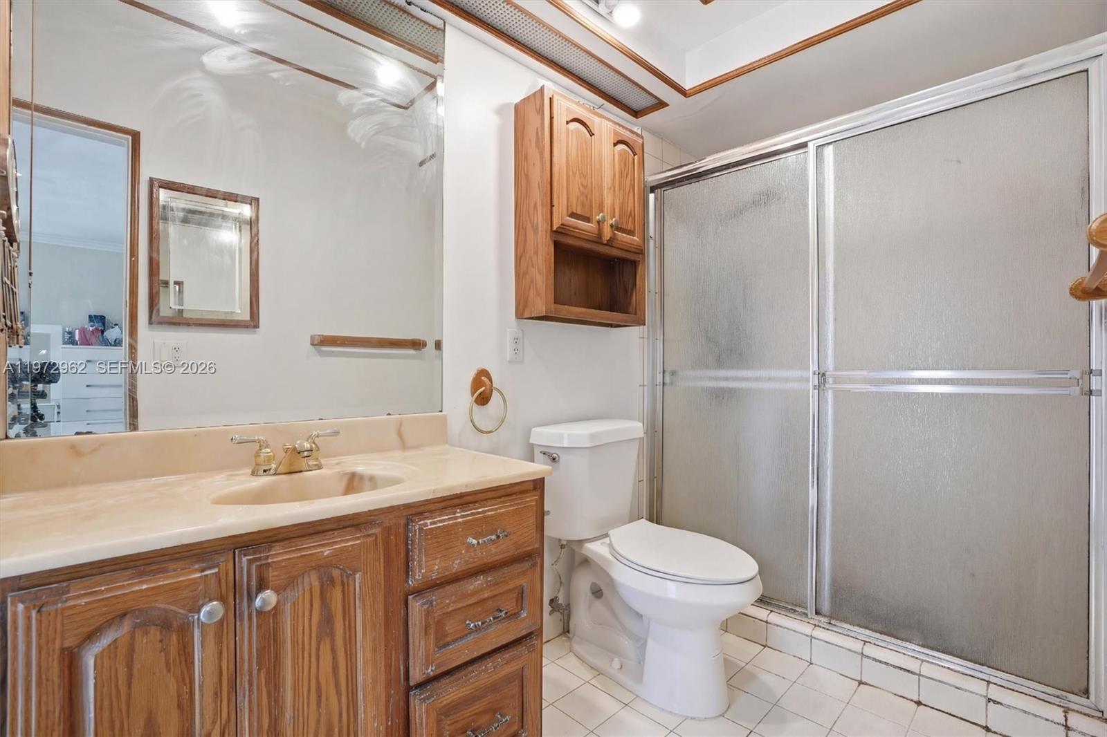 5518 McKinley Street Hollywood, FL 33021 - Photo 13 of 21 a bathroom with a sink toilet and shower