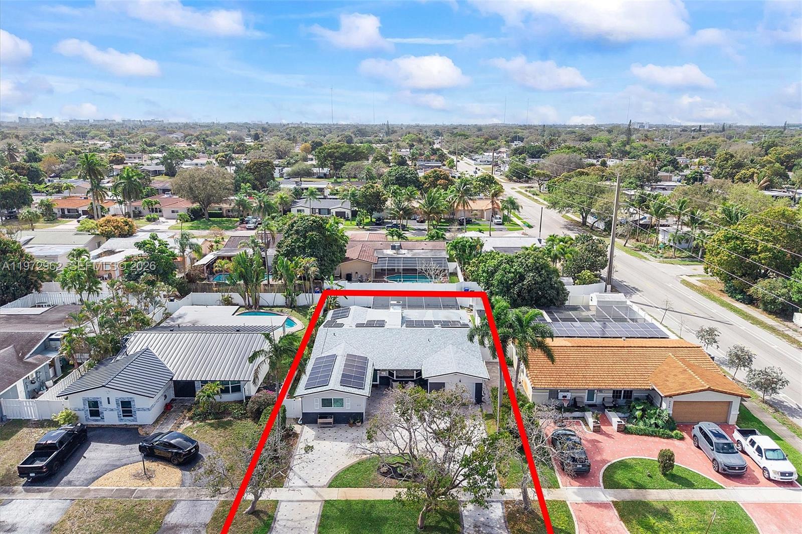 5518 McKinley Street Hollywood, FL 33021 - Photo 15 of 21 an aerial view of residential houses with outdoor space