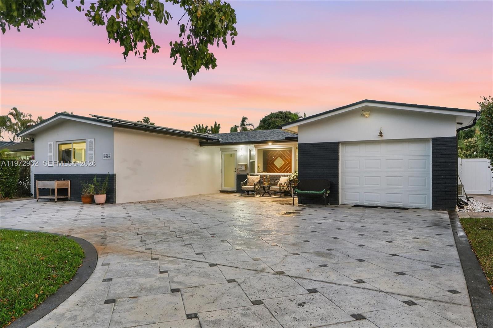 5518 McKinley Street Hollywood, FL 33021 - Photo 18 of 21 a view of a house with a patio
