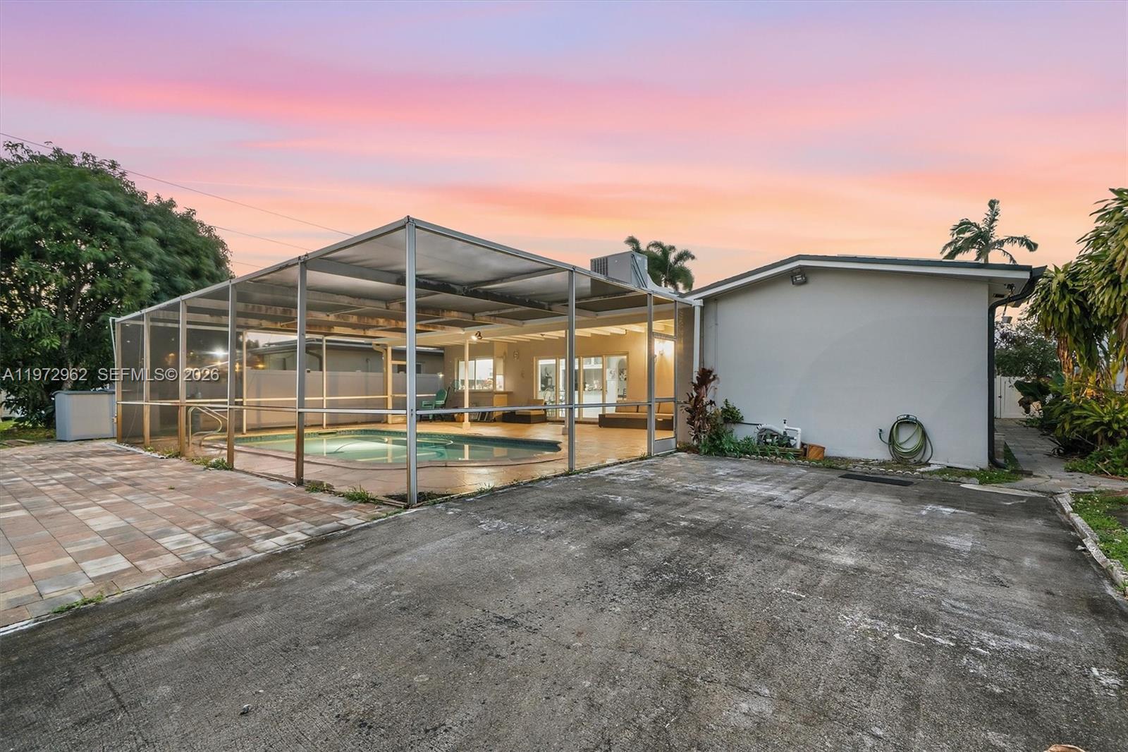 5518 McKinley Street Hollywood, FL 33021 - Photo 19 of 21 a view of a house with backyard and balcony