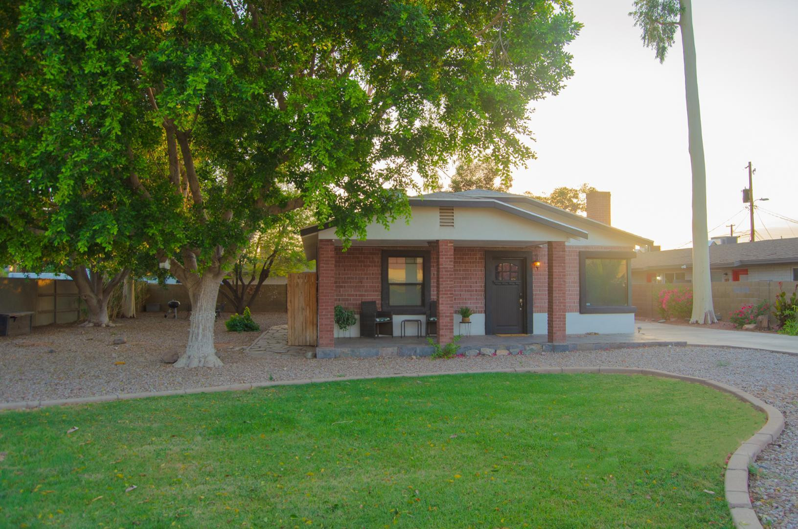 3202 North 37th Street Phoenix, AZ 85018 - Photo 3 of 19 a front view of a house with patio