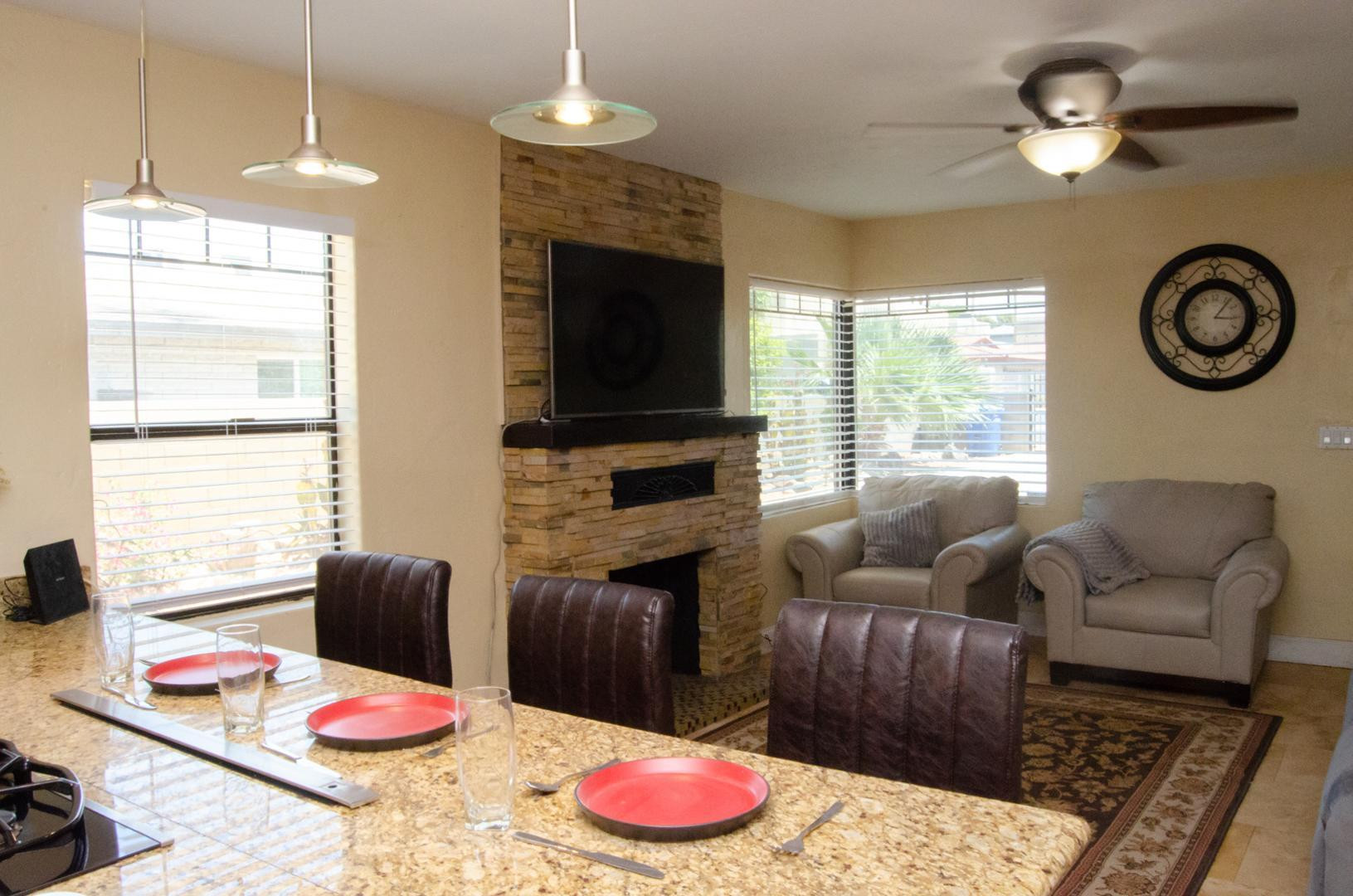 3202 North 37th Street Phoenix, AZ 85018 - Photo 10 of 19 a living room with furniture fireplace and flat screen tv