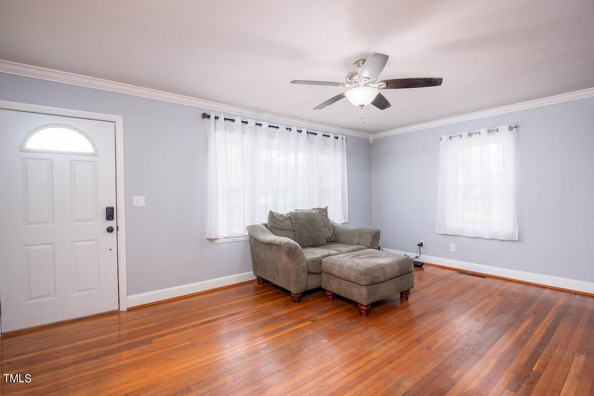 904 Frank Street Roxboro, NC 27573 - Photo 4 of 20 a living room with couches and a window