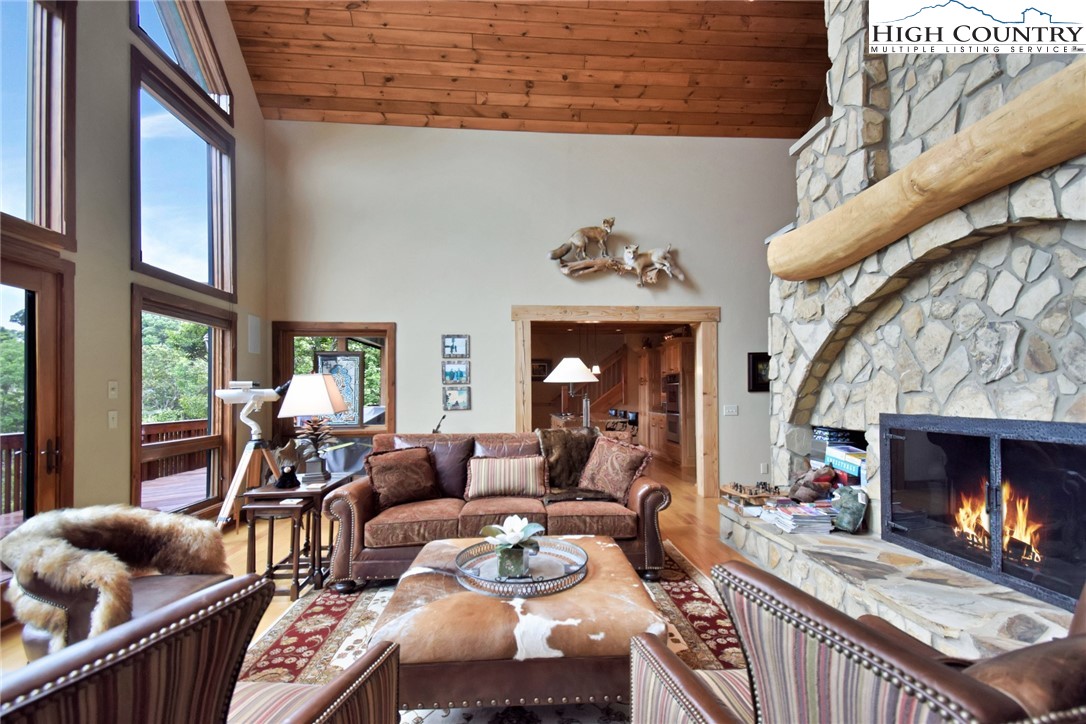 86 Tyneridge Road Banner Elk, NC 28604 - Photo 12 of 50 a living room with furniture and a fireplace