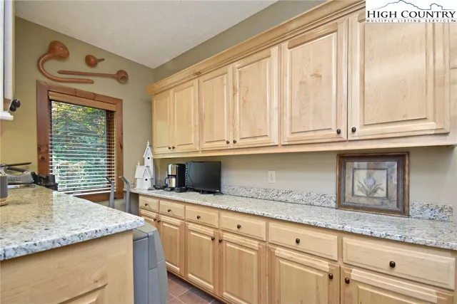 a bed room with a bed and furniture