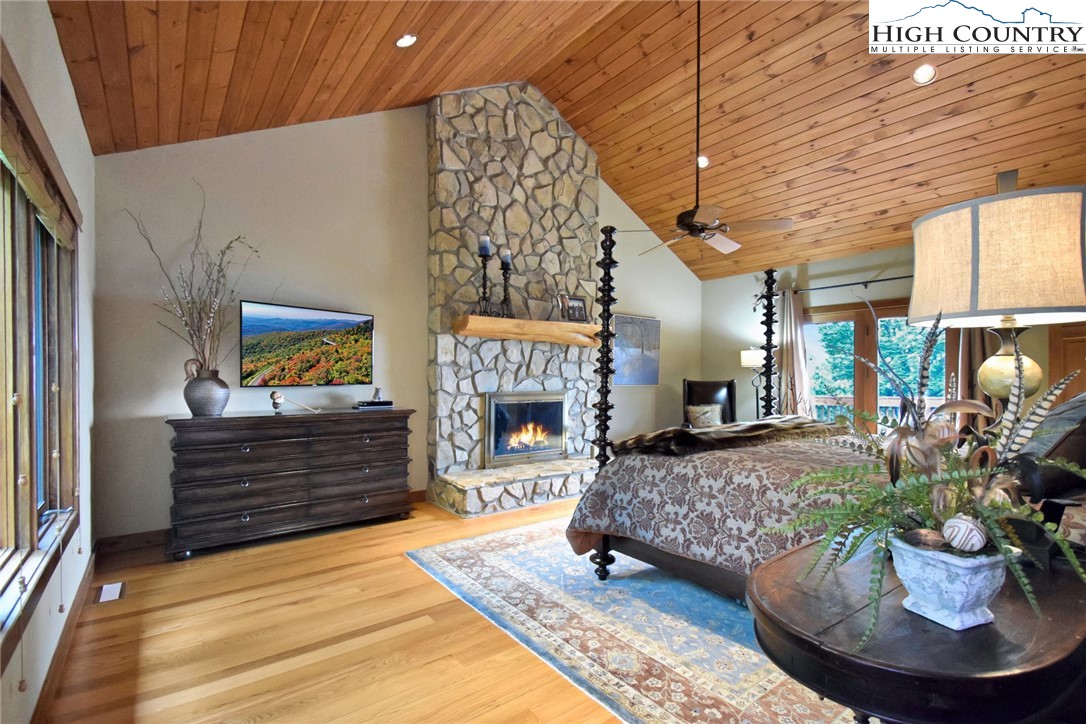 86 Tyneridge Road Banner Elk, NC 28604 - Photo 19 of 50 a living room with furniture and a fireplace