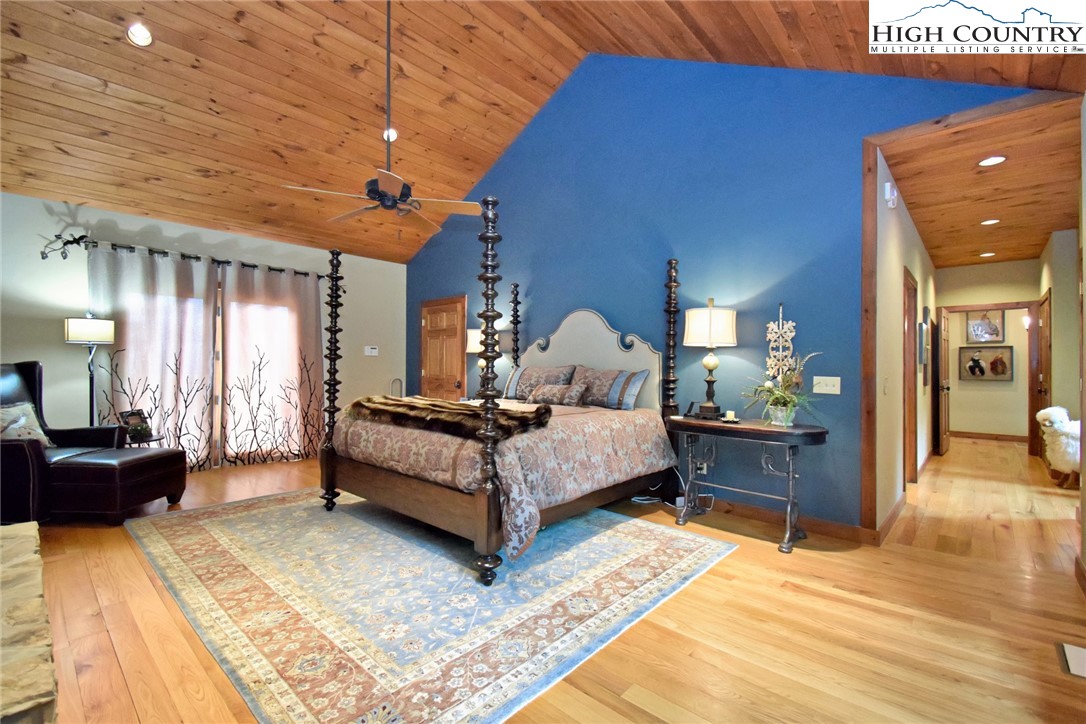 86 Tyneridge Road Banner Elk, NC 28604 - Photo 20 of 50 a bed room with a bed and furniture