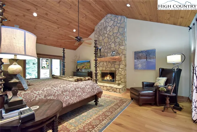 a spacious bathroom with a granite countertop sink and a mirror