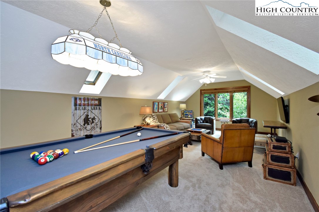 86 Tyneridge Road Banner Elk, NC 28604 - Photo 37 of 50 a room with furniture and window