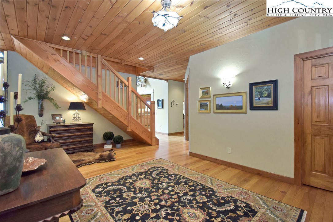 86 Tyneridge Road Banner Elk, NC 28604 - Photo 4 of 50 a view of entryway and hall with wooden floor