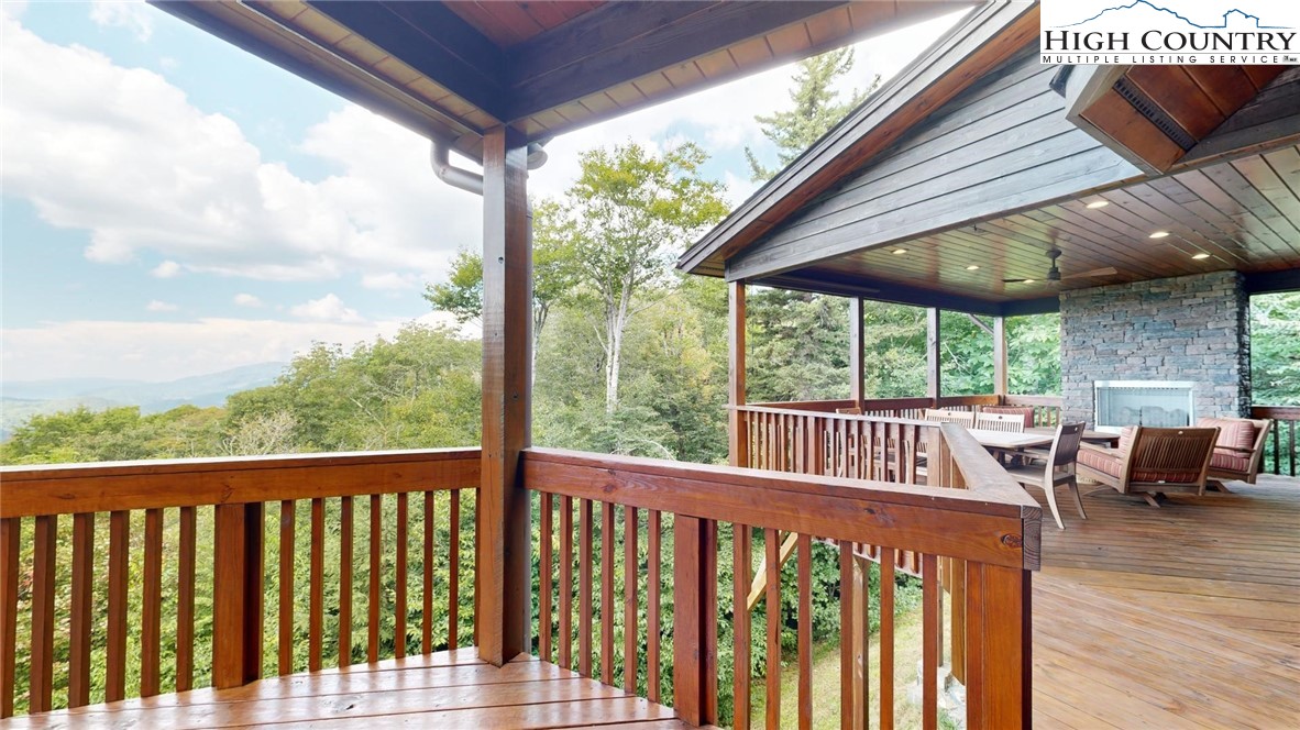 86 Tyneridge Road Banner Elk, NC 28604 - Photo 41 of 50 a view of a two chairs and table in the balcony