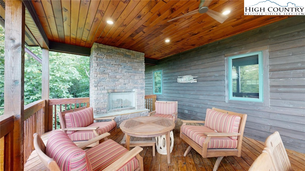 86 Tyneridge Road Banner Elk, NC 28604 - Photo 45 of 50 a outdoor living space with furniture and a fireplace