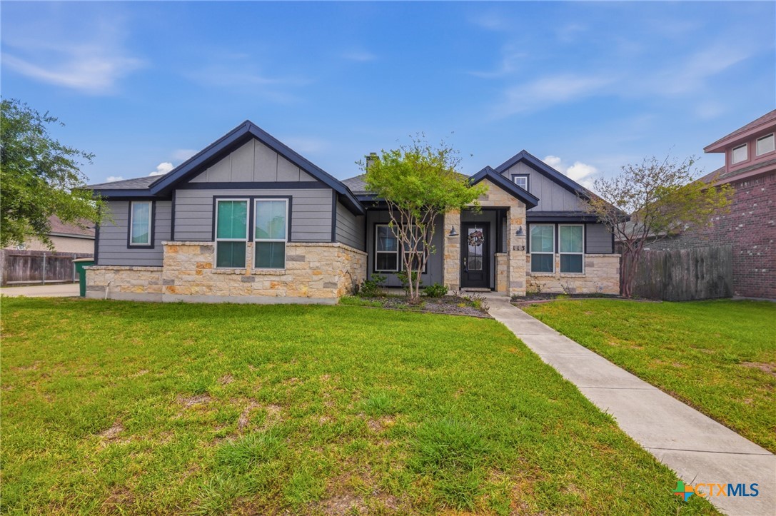 113 Terra Vista Ranch Road Victoria, TX 77904 - Photo 3 of 47 a front view of a house with a yard and porch