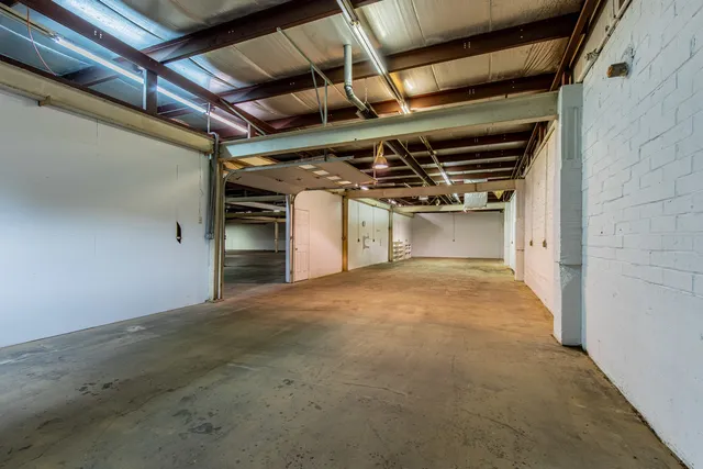 a view of a building with a street