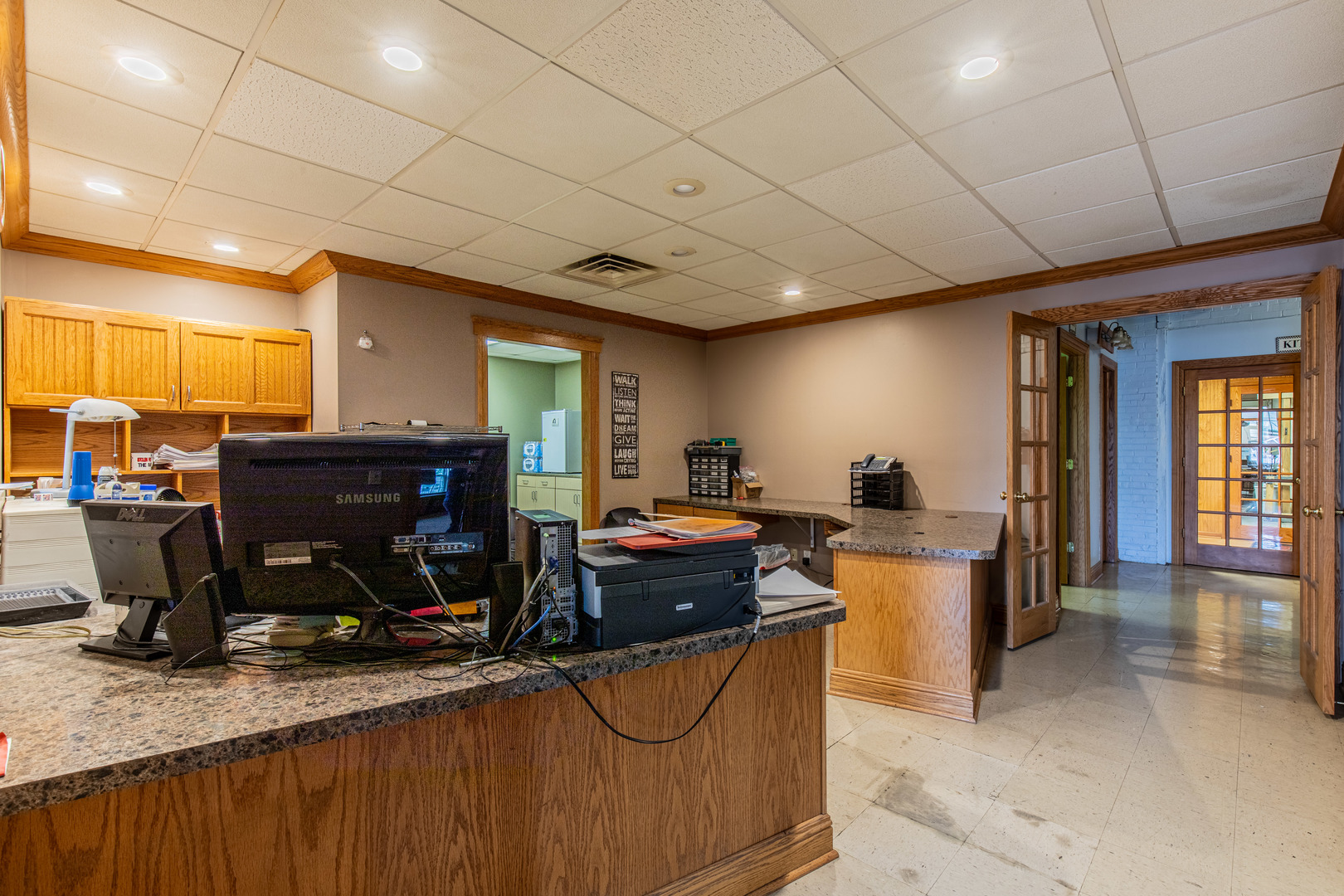 825 North Pleasant Street Princeton, IL 61356 - Photo 7 of 32 a living room with furniture a flat screen tv and a fireplace