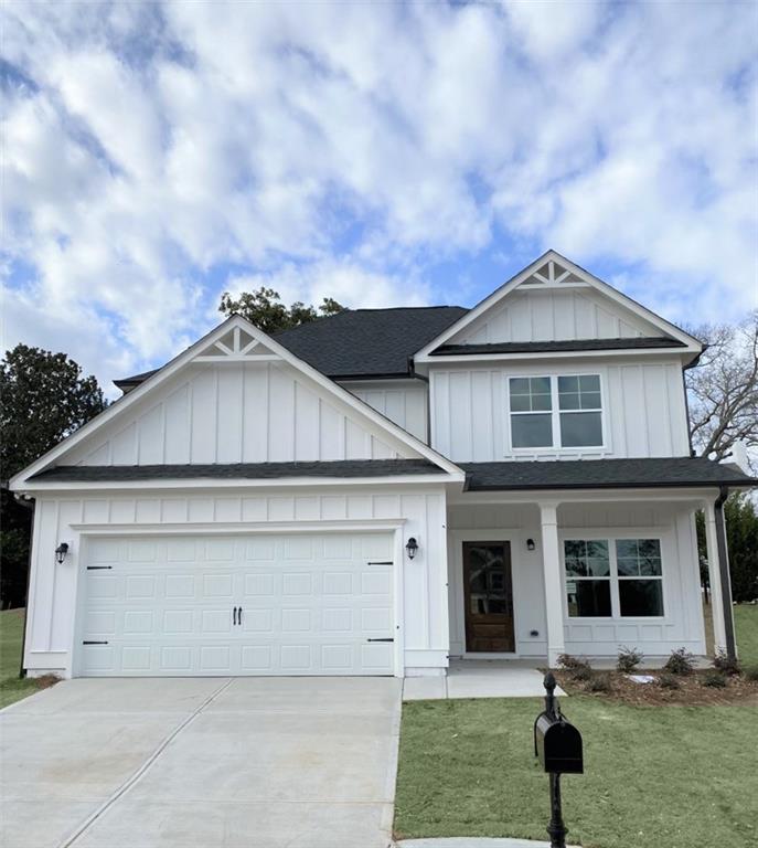 136 Russell Way Athens, GA 30606 - Photo 1 of 1 a front view of a house with garden