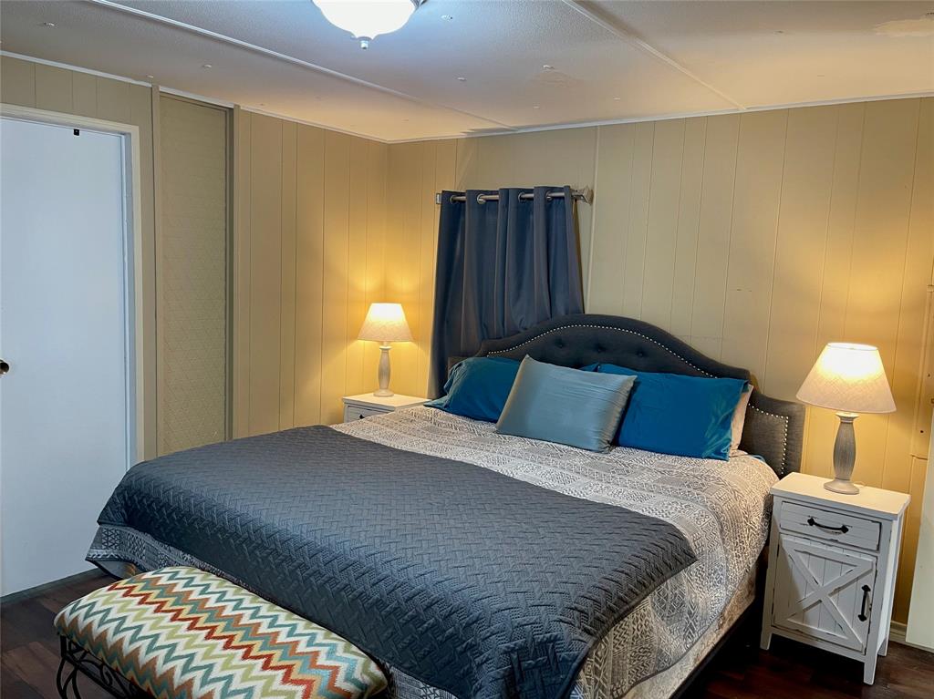 2334 San Bar Road, Unit 50 Graford, TX 76449 - Photo 19 of 40 Large primary bedroom with en-suite bathroom.