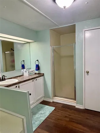 a bathroom with a sink and mirror
