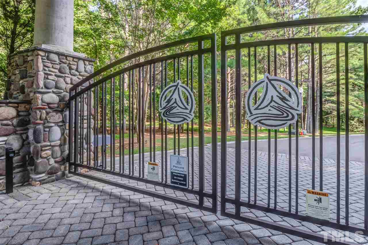5801 Creek Pointe Way Raleigh, NC 27614 - Photo 5 of 8 a view of a wrought iron gate