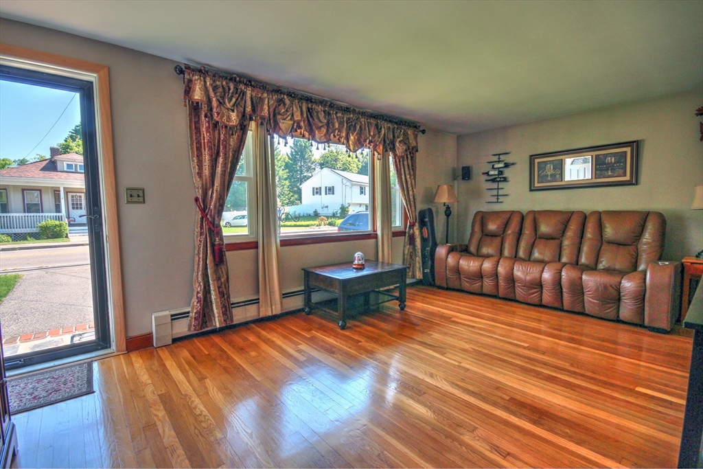 289 Winter Street Brockton, MA 02302 - Photo 11 of 27 a bedroom with a bed and a large window