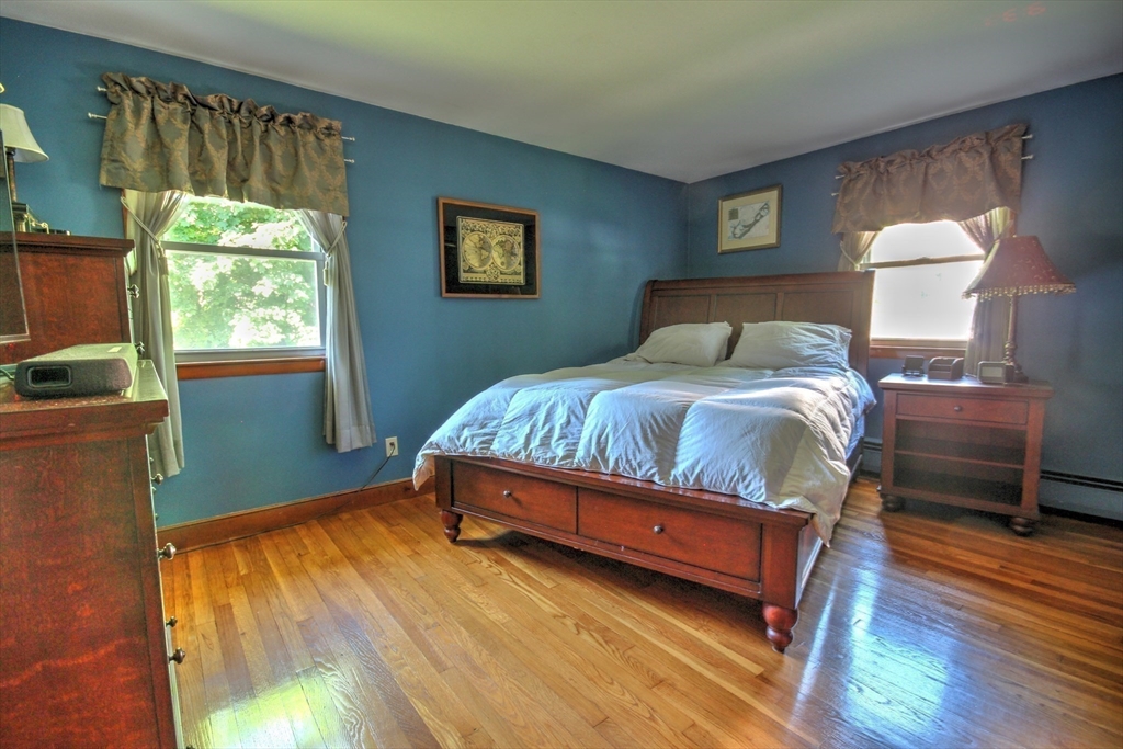 289 Winter Street Brockton, MA 02302 - Photo 13 of 27 a bedroom with a bed and a window