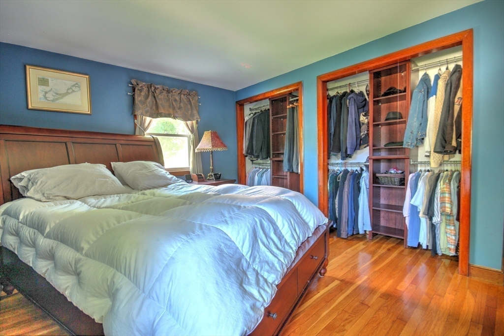 289 Winter Street Brockton, MA 02302 - Photo 15 of 27 a bed sitting in a bedroom next to a window