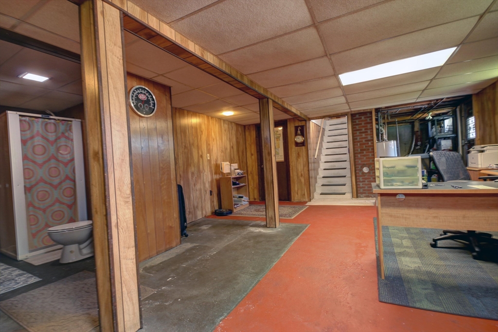 289 Winter Street Brockton, MA 02302 - Photo 21 of 27 a view of a hallway with bathroom and a shower