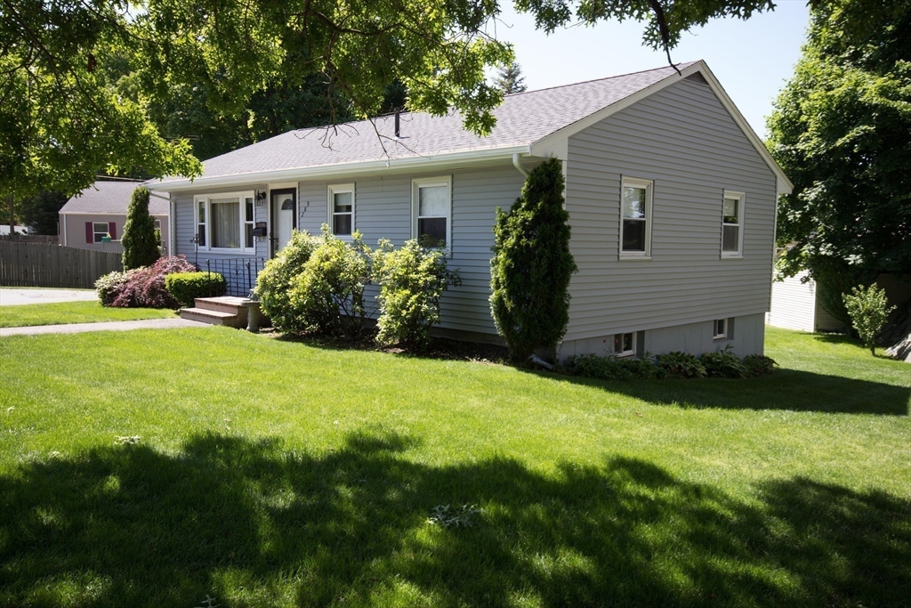 289 Winter Street Brockton, MA 02302 - Photo 3 of 27 a view of a house with a yard and plants