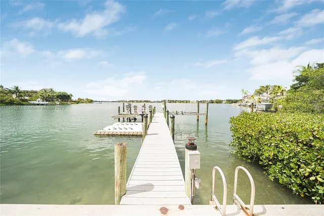 a kitchen with stainless steel appliances a stove oven and a refrigerator