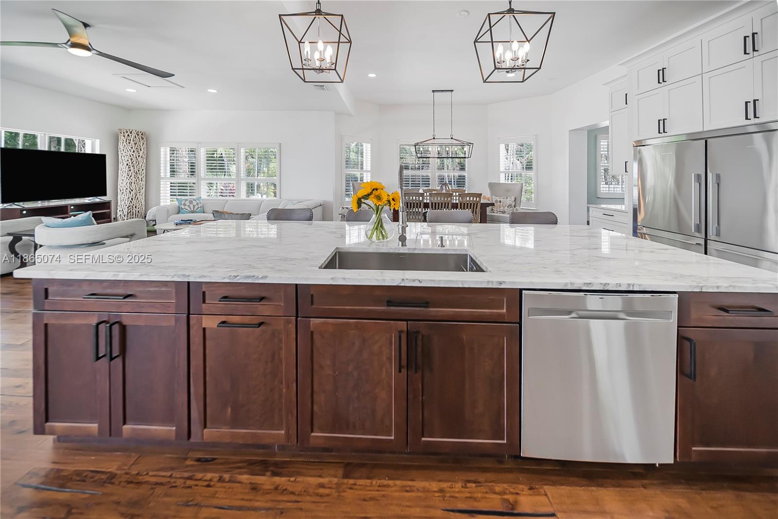1020 Lands End Way Jupiter, FL 33458 - Photo 19 of 79 a kitchen with stainless steel appliances granite countertop a sink a stove and a microwave