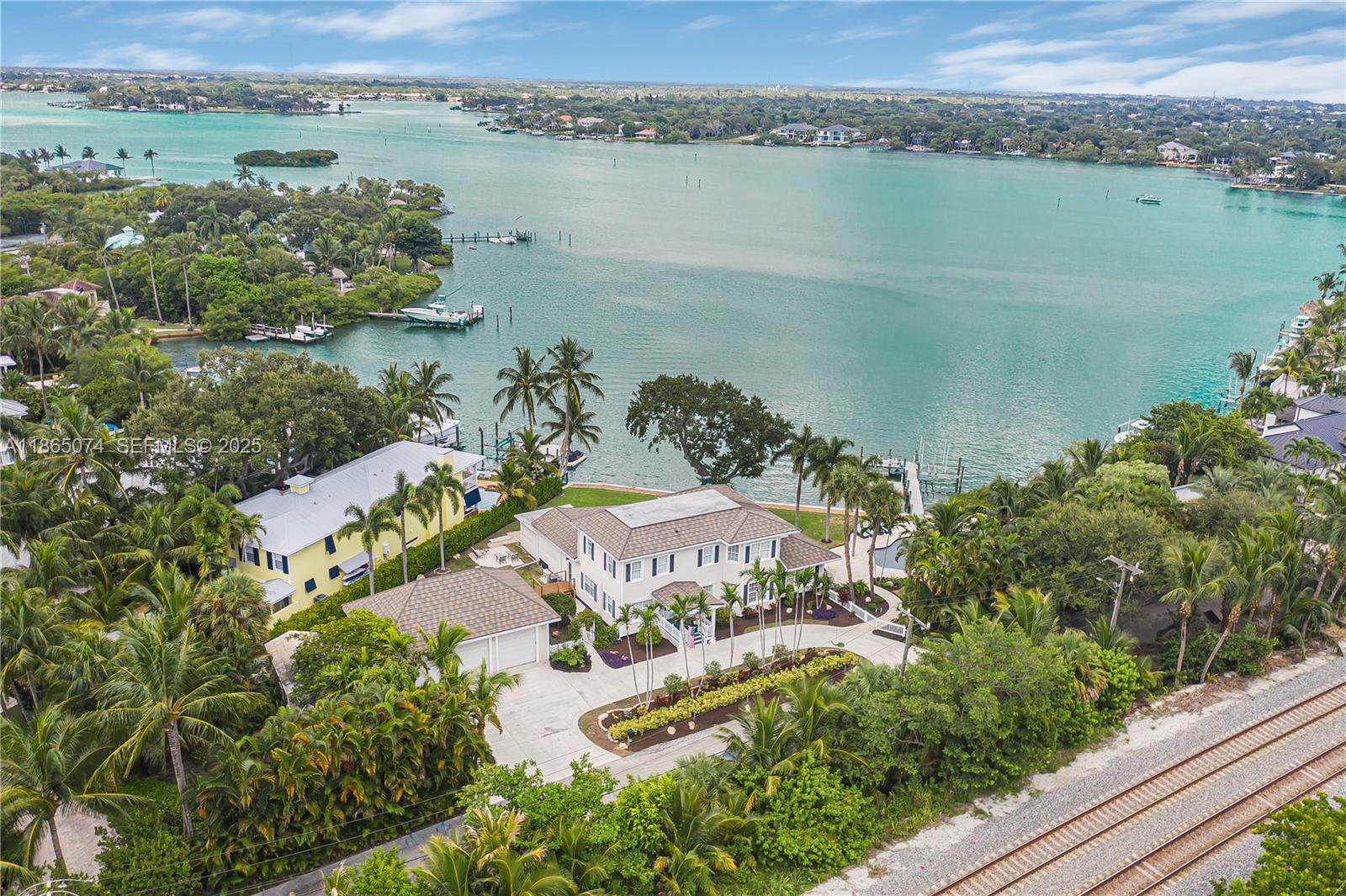 1020 Lands End Way Jupiter, FL 33458 - Photo 2 of 79 a view of a lake with a mountain view