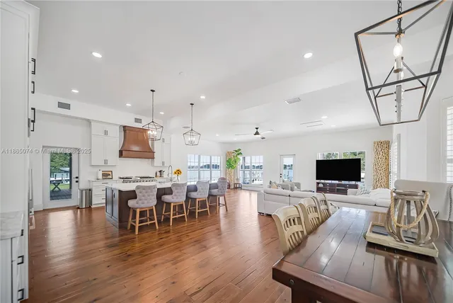 a living room with a bed and a window