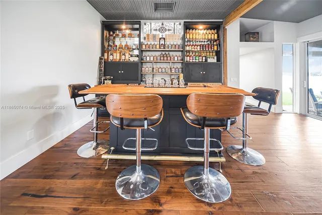 an aerial view of house with yard