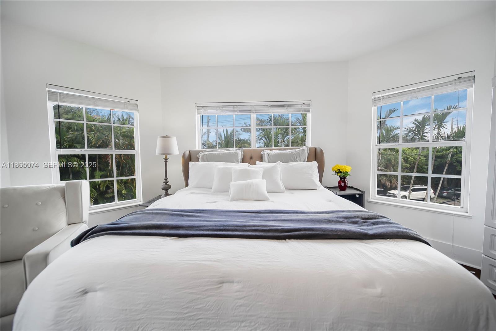 1020 Lands End Way Jupiter, FL 33458 - Photo 58 of 79 a spacious bedroom with a bed and a window