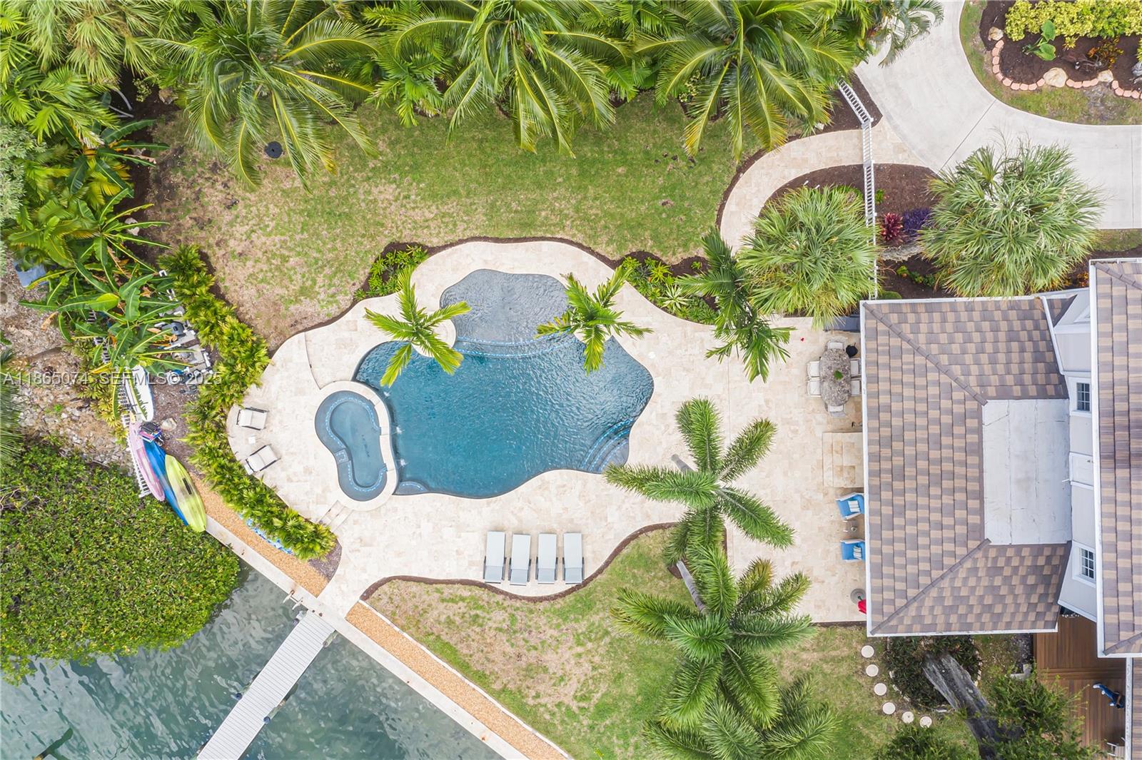 1020 Lands End Way Jupiter, FL 33458 - Photo 75 of 79 a close up of a flower pot with a garden view