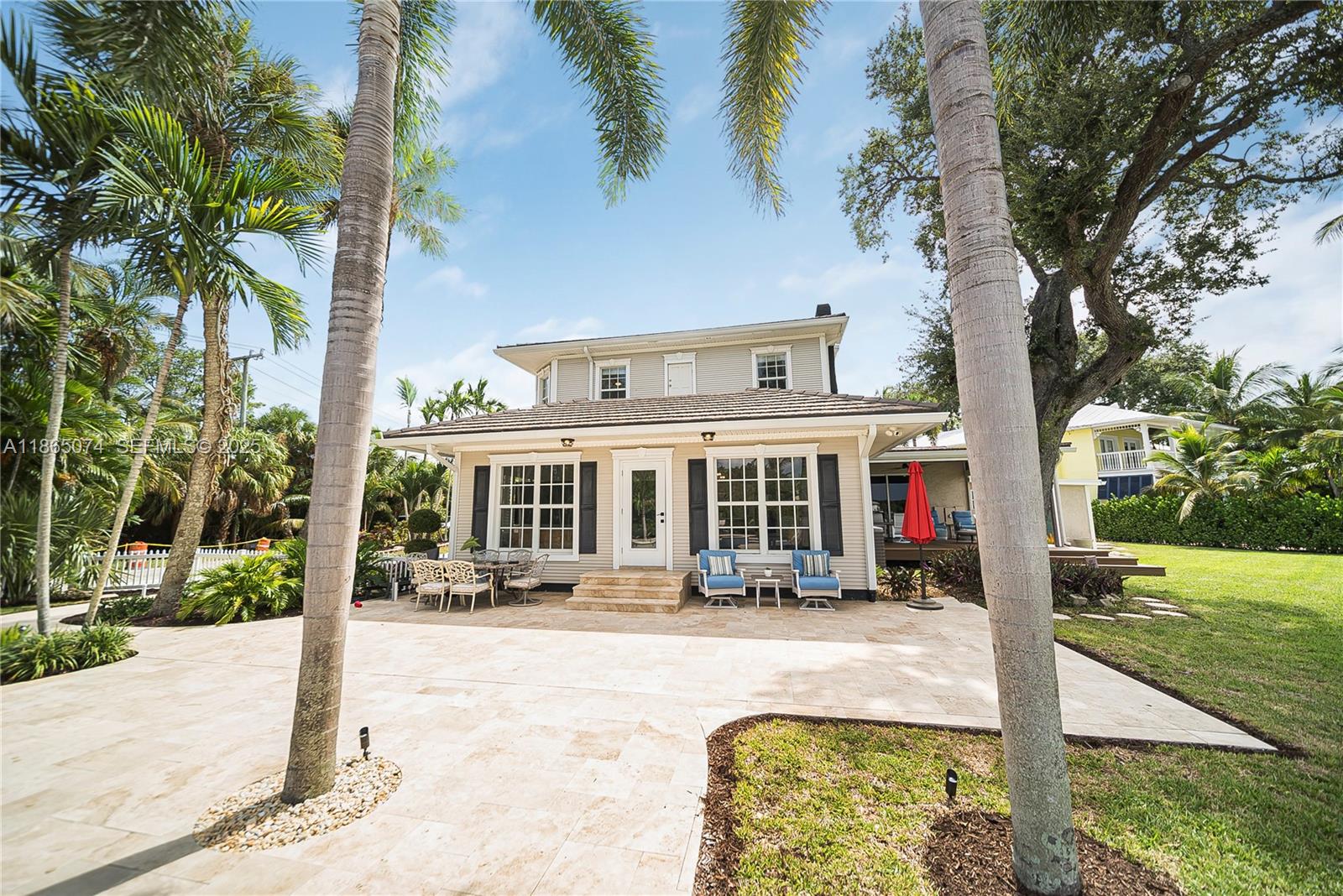 1020 Lands End Way Jupiter, FL 33458 - Photo 8 of 79 a view of a house with sitting area and garden