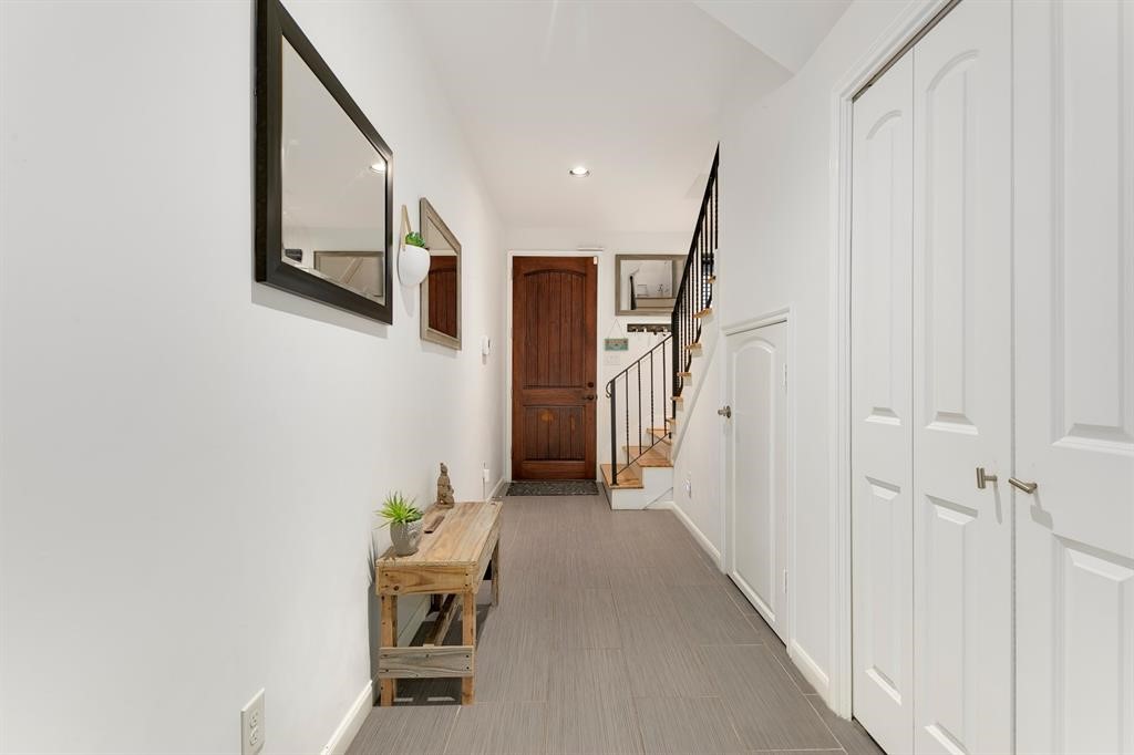 1841 Radcliffe Street Houston, TX 77007 - Photo 11 of 31 a hallway with wooden floor and entryway