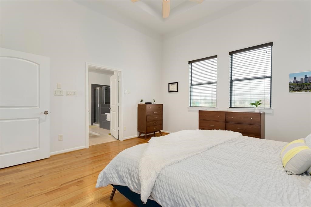 1841 Radcliffe Street Houston, TX 77007 - Photo 17 of 31 a bedroom with a bed and a window