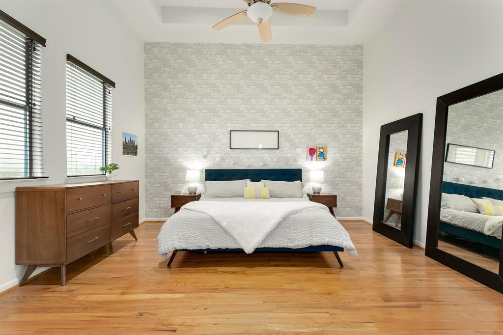 1841 Radcliffe Street Houston, TX 77007 - Photo 18 of 31 a bedroom with a bed and window