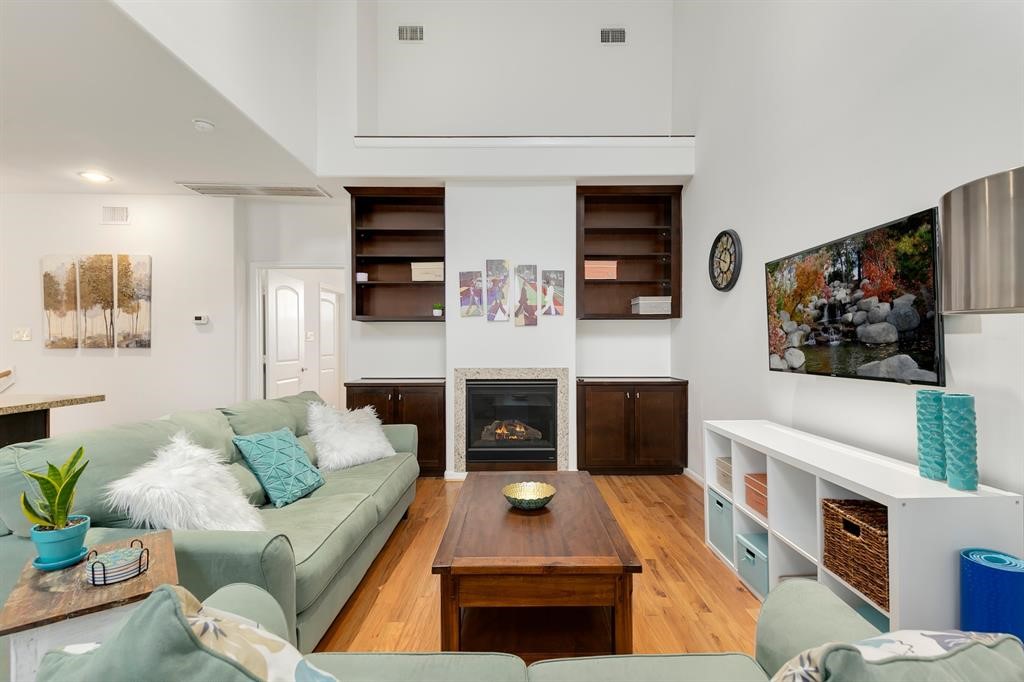 1841 Radcliffe Street Houston, TX 77007 - Photo 2 of 31 a living room with furniture and a fireplace
